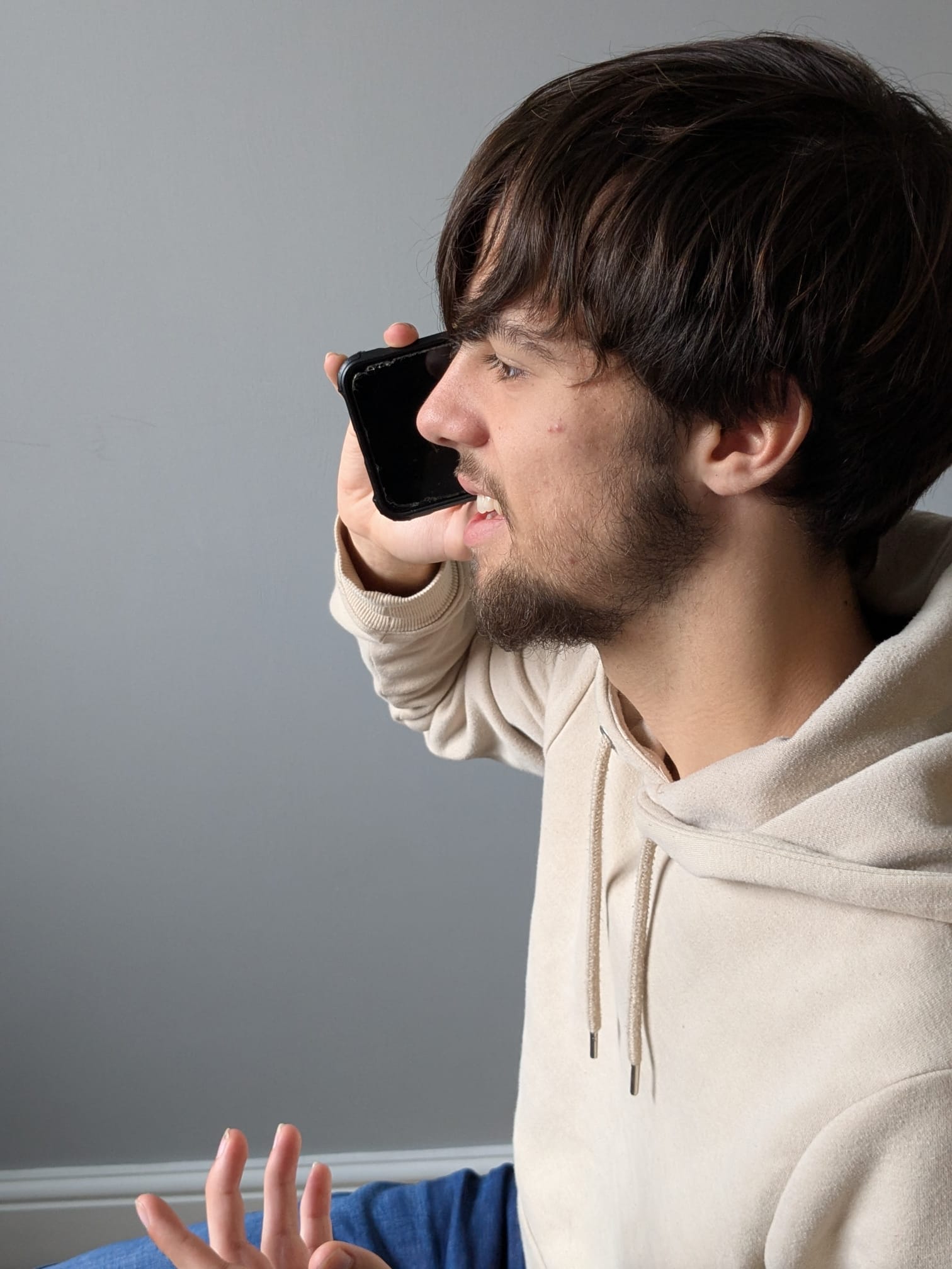 Owner of Shakespeare Web & Social on phone